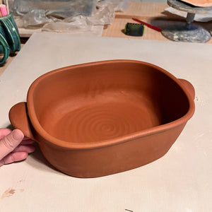 casserole dish, wheel thrown and altered with pulled handle added. before being bisque fired