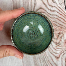 Load image into Gallery viewer, Tiny bowl, sauce bowl, ring dish. Wheel thrown on the potters wheel in a red stoneware clay  and glazed in Moss Green glaze, which shows depth and a variety of color.