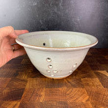Load image into Gallery viewer, A wheel thrown pottery colander in speckled white glaze. 8&quot; diameter colander