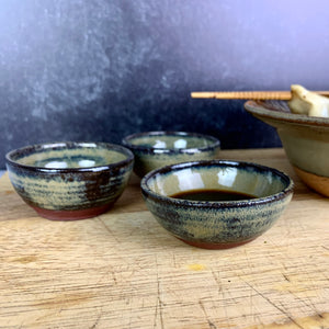 Sauce bowls for soy, hot sauce. wheelthrown pottery bowls made of stoneware. Tea bag holders, ring holders. made at Fern Street Pottery