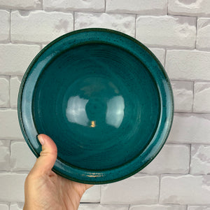 Large, wheel thrown serving bowl. Thrown in a deep red stoneware and glazed in rich teal