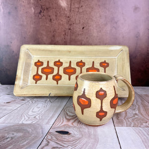 newly made, vintage style. This MidMod serving tray is designed to fit in with your MidCenturyModern style. shown here in Dijon Yellow with orange accent, and some beautiful red stoneware clay showing through. also shown with a MidMod mug, sold separately