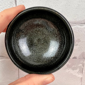 tiny bowl shown in black sparkle glaze
