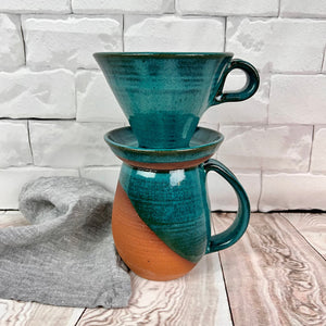 Showing an angle dipped mug and pour over in Teal. handcrafted, wheel thrown stoneware pottery