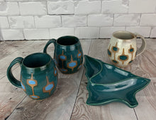 Load image into Gallery viewer, MidMod Mugs Freshly made with vintage inspired design and color. teal, white, turquoise, round square pattern. Shown here with a christmas candy dish made from a vintage Mid Century Mold. Fern Street Pottery