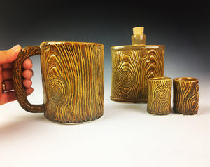 woodgrain, lumberjack style pottery with woodgrain texture. hand built pottery mug, flask and shot glasses