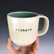 Load image into Gallery viewer, pottery mug with custom text &quot;richard&quot;. white mug with green interior