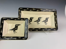 Load image into Gallery viewer, two rectangular crow platters. stoneware pottery with sgraffito carvings of crows and crow footprints around the edges. large and small size.