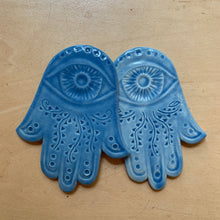 Load image into Gallery viewer, ceramic hamsa wall hanging, hand carved, two here, shown in Sky blue