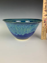 Load image into Gallery viewer, wheelthrown blue world bowl. the bowl is glazed in cobalt blue with turquoise green glaze melting down into the blue from the rim of the bowls. 