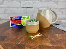 Load image into Gallery viewer, Pottery match striker made from stoneware. Strike on Pot with &quot;Strike anywhere&quot; matches.wheel thrown at Fern Street Pottery. shown here with a matching angle dipped mug