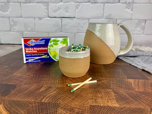 Pottery match striker made from stoneware. Strike on Pot with "Strike anywhere" matches.wheel thrown at Fern Street Pottery. shown here with a matching angle dipped mug