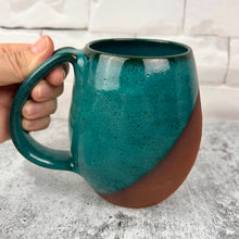 Load image into Gallery viewer, angle dipped mug with Teal Glaze over deep red stoneware clay. beautiful color and textures. Fern Street Pottery. Angle dipped mug.