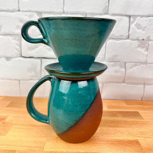 Coffee pour over and matching  angle dipped mug. shown in Teal glaze over rich red stoneware. Fern Street Pottery