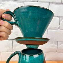 Load image into Gallery viewer, Coffee pour over shown in Teal glaze over rich red stoneware. Fern Street Pottery