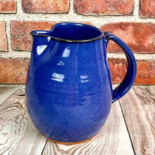 Load image into Gallery viewer, Stoneware pottery pitcher  in Cobalt Blue on Red Stoneware with pulled handle. handcrafted and wheel thrown at Fern Street Pottery