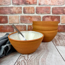 Load image into Gallery viewer, set of four stacking bowls, perfect size for soup, cereal, salad, or ice cream. These bowls are glazed with a Glossy, speckled, white glaze inside and feature the red-brown exposed stoneware clay on the exterior.