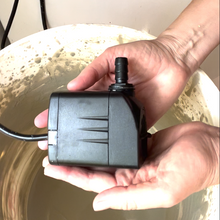 Load image into Gallery viewer, Image of the tried and tested submersible part of the Glaze Splash Glaze Fountain kit from Fern Street Pottery before it is submerged in glaze. shown here with the thinnest spout attachment (included)