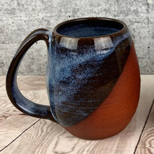 Load image into Gallery viewer, wheel thrown, stoneware mug in icy blue angle dipped glaze
