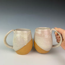 Load image into Gallery viewer, Showing two mugs from the coffee gift set including two angle dipped coffee mugs, one coffee pour over and a matching bud vase. handcrafted, wheel thrown stoneware pottery