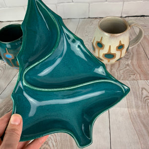 vintage style christmas tree shaped candy dish in Teal glaze, shown with coordinating  midcentury style mugs.