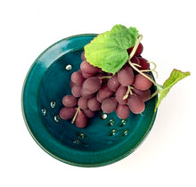 Load image into Gallery viewer, Berry colander in teal glaze on red clay. shown with rinsed  grapes