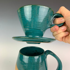 Detail shot of bottom of Coffee pour over and drip edge. wheel-thrown pottery, teal angle dipped mug. shown with matching coffee pour over in Teal. Fern Street Pottery