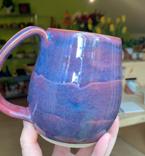 Load image into Gallery viewer, Northwest Mug in layers of Pink Sunset glaze. Handcrafted and wheelthrown by Meredith at Fern Street Pottery
