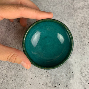 tiny sauce bowl, wheel thrown at Fern Street Pottery, shown in teal