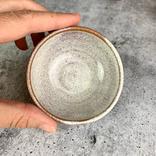 Load image into Gallery viewer, tiny sauce bowl, wheel thrown at Fern Street Pottery, shown in speckled white on. red stoneware clay