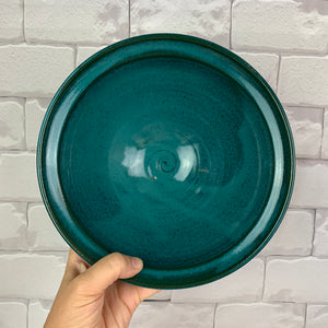 Large, wheel thrown serving bowl. Thrown in a deep red stoneware and glazed in rich teal 