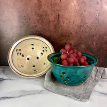 Load image into Gallery viewer, Pint + size berry colanders. Wheel thrown pottery, red stoneware shown in white and teal glaze.