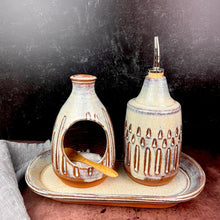 Load image into Gallery viewer, Salt cellar and Oil Cruet set with matching tray shown together here. Made in a red stoneware clay, carved and glazed in a speckled white glaze. Fern Street Pottery