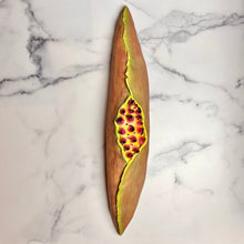 Load image into Gallery viewer, full image of a seedpod sculpture by meredith chernick of fern street pottery. the sculpture is made of porcelain and cold finished in bright colors with smooth hombre blends. this sculpture depicts a seedpod&#39;s husk with small protrusions emerging from within.