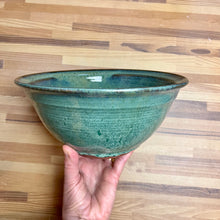 Load image into Gallery viewer, large &quot;Mottled Green&quot; serving bowl. wheelthrown, trimmed and glazed by Artist, Meredith Chernick. the bowl is glazed in a rich mottled green glaze that shows the beautiful red clay through the edges.. No two are ever the same, each with unique glaze patterns