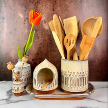 Load image into Gallery viewer, Bud vase thrown in red stoneware clay, carved and glazed in speckled white clay. Shown here in a setting with aMini Bud vase, salt cellar, utensil holder and tray.
