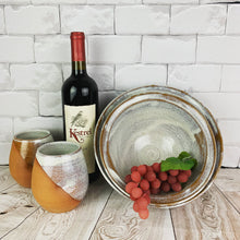 Load image into Gallery viewer, two pottery wine tumblers in speckled white, shown here with two matching serving bowls