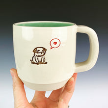 Load image into Gallery viewer, Pug mug for the pug lover. white cylindrical  mug with a pug stamped in in brown, and a heart in a speech bubble in red. Turquoise green interior on this mug.