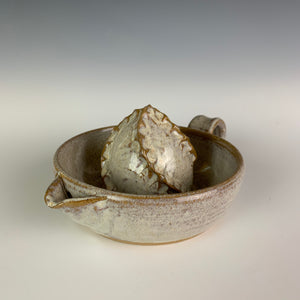 Pottery Citrus juicer, thrown on the wheel in red clay, glazed in speckled white.