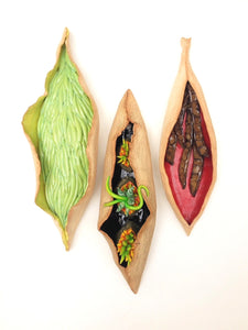 "Pods within Pod" Sculpture, shown hanging with two other seed pod sculptures