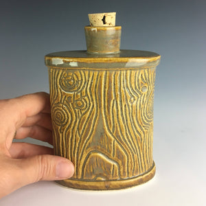 pottery flask, carved to look like woodgrain