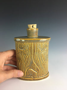 pottery flask, carved to look like woodgrain