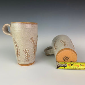pottery travel mug, showing the bottom diameter of a typical mug