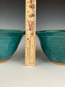 carved rim bowls in teal, showing the dimensions, marked by a ruler. These are just under 4" tall