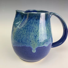 Load image into Gallery viewer, Blue world pottery pitcher. cobalt blue glaze with turquoise glaze play on top half. wheel thrown, artisan pottery