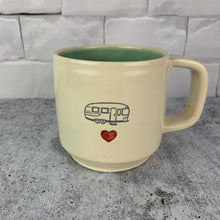 Load image into Gallery viewer, Camper Love Mug, with an image of a camper stamped into the mug, a red heart is stamped in and painted below it.. White clay, turquoise glaze on the inside. this mug was wheel thrown and hand stamped and colored at fern street pottery.
