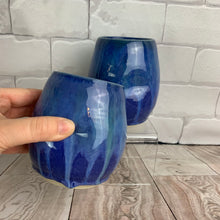 Load image into Gallery viewer, Tumblers in Blue World Glaze, Tumblers are great for wine, cocktails or anything. Finger and thumb divots are pressed into the tumblers for good grip.