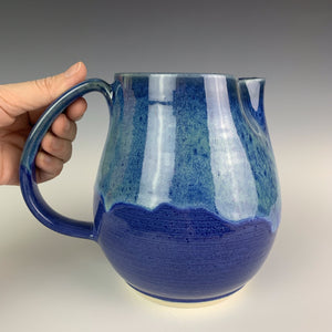 Pitcher in blue, blue world glaze combo. wheel thrown artisan pottery